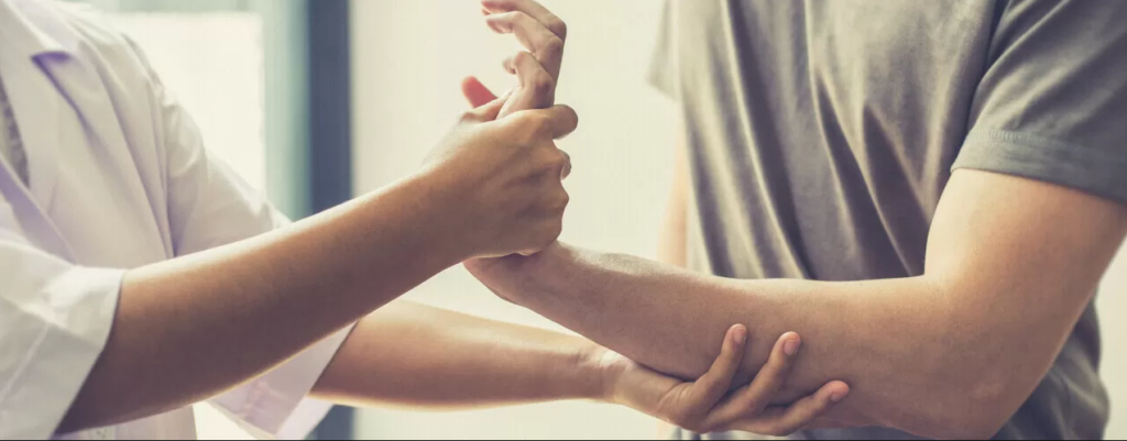 a man suffering from arthritis pain