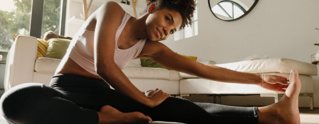 a young lady doing Stretching exercise